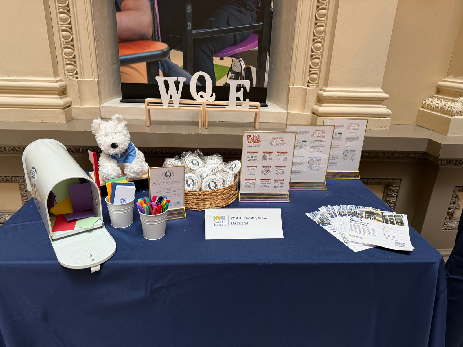The West Q table with WQE letters, the wishes mailbox and family information cards